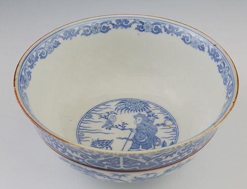 Chinese Blue & White Porcelain Bowl, 19th c, the interior with a blue floral banded rim and a reserve of a woman in a landscape, the exterior with a w