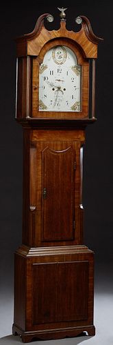 English Inlaid Oak and Mahogany Tall Case Clock, c. 1850, the hood with a broken arch pediment with a central brass urn finial and brass mounts and br