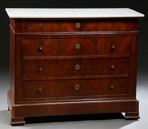 French Louis Philippe Style Carved Mahogany Marble Top Commode, 19th c., the rounded edge white marble over a frieze drawer, three graduated lower dra