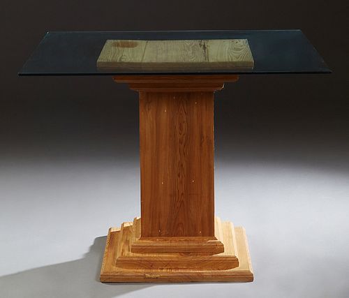 Contemporary Cypress Breakfast Table, 20th c., the thick square glass top on a central stepped square support, H.- 30 1/8 in., W.- 39 in., D.- 39 in.