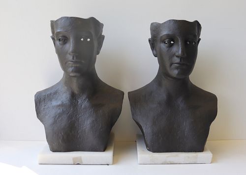 A Matched Pair of Patinated Metal Busts On Marble