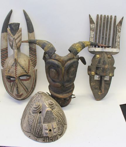 4 Antique Carved Wood African Masks.