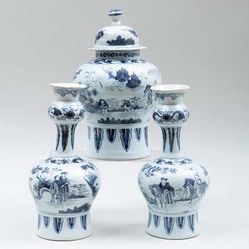 Pair of Dutch Delft Blue and White Bottle Vases and a Baluster Vase and Cover