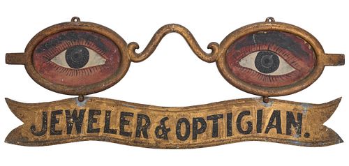 A CLASSIC PAINTED IRON AND ZINC OPTICIAN'S TRADE SIGN