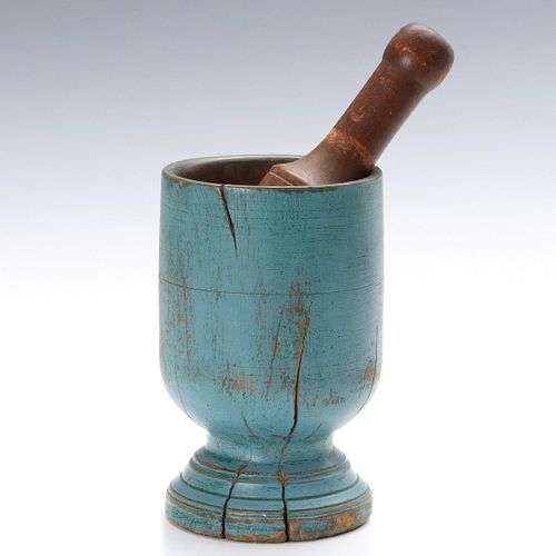 AN EARLY 19TH C. WOOD MORTAR WITH PESTLE AND BLUE PAINT