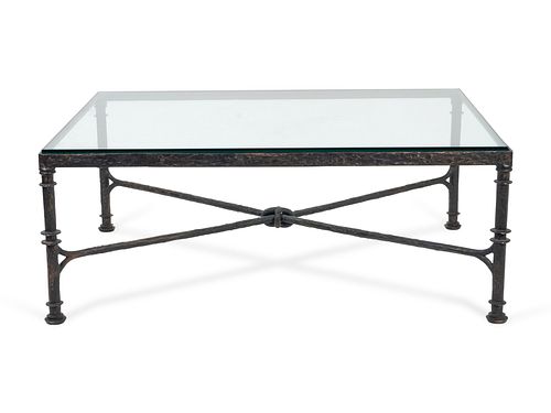 An Etruscan Style Bronze Low Table
Height 18 1/4 x length 48 x width 36 1/4 inches.