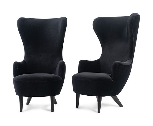 A Pair of Tom Dixon Wingback Chairs
Height 50 x width 27 1/2 inches.