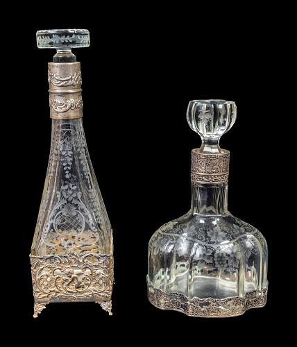 Two Continental Silver-Mounted Etched Glass Decanters
Height of tallest 12 3/4 inches.