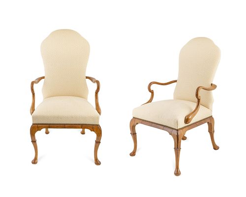 A Pair of Queen Anne Style Upholstered Walnut Armchairs
Height 43 1/2 x width 25 1/2 x depth 22 1/2 inches.