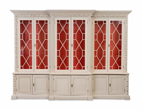 A George III Style White-Painted Breakfront Bookcase
Height 97 1/2 x length 127 1/2 x depth 21 inches.