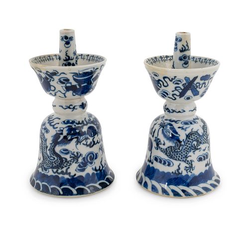 A Pair of Chinese Blue and White Porcelain Candle Holders
Height 6 1/4 inches.