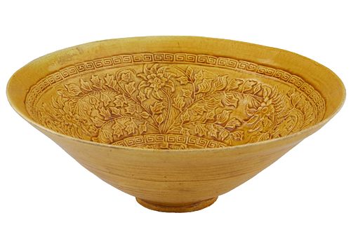 Chinese Thinly Glazed Yellow Bowl, 17th c., the conical sides with Greek key banding over relief leaves and vines with two central Chinese character m