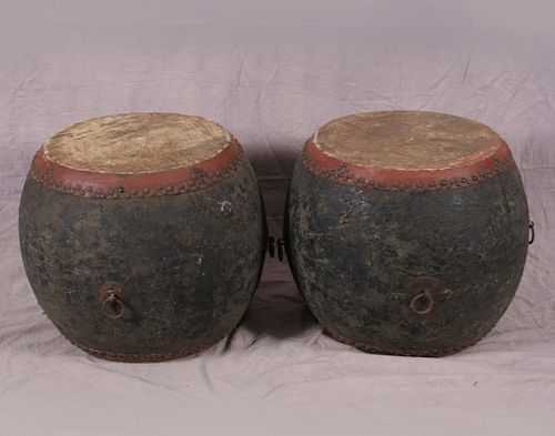 A rare pair Chinese large lacquer drums with leather