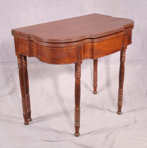 American cherry and walnut game table, c. 1850