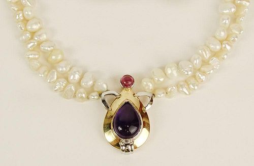 Lady's vintage cabochon amethyst, cabochon pink sapphire, 14 k and baroque pearl necklace.