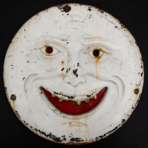 A SMILING 'MAN IN THE MOON IRON SHOOTING GALLERY TARGET