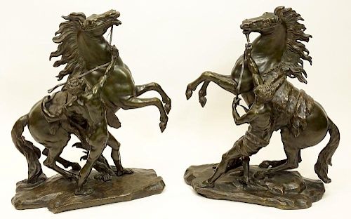Pair of late 19th century French bronze Marly horses after: Guillaume Coustou the Younger, French (1716-1777).