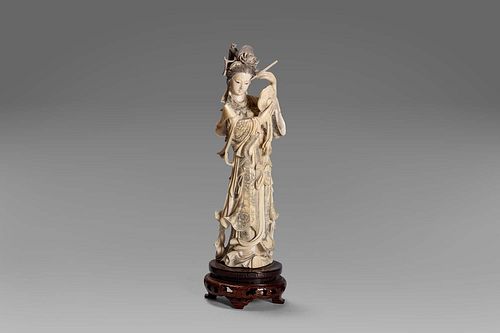 Ivory sculpture depicting a female figure with a mirror, China, early 20th century