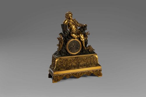 Clock in gilded bronze and dark patina, with a seated youth, 19th century