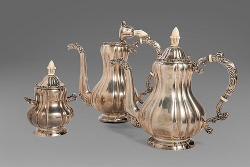 Silver service consisting of coffee pot, teapot and sugar bowl, 20th century