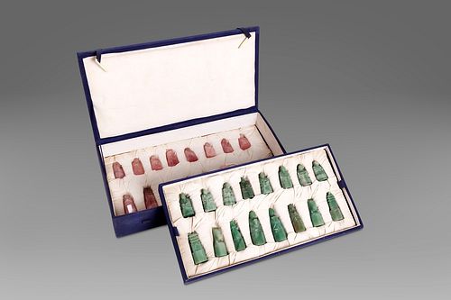 Sixteen chess pieces in jade and sixteen in rose quartz, in box, China, 20th century