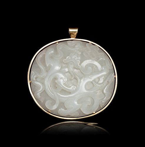 A Carved White Jade 'Chilong' Plaque
Length 3 in., 7.6 cm.