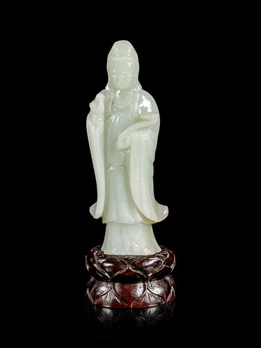 A Pale Celadon Jade Figure of Guanyin
Height of figure 6 in., 15.24 cm.