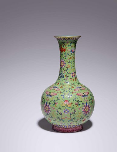 A Lime-Green Ground Famille Rose Porcelain Bottle Vase
Height 12 in., 30.48 cm
