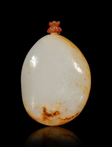 A White Jade Pebble-Form Snuff Bottle
Height overall 3 in., 7.6 cm.