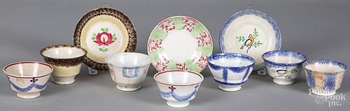 Assorted spatter cups and saucers.