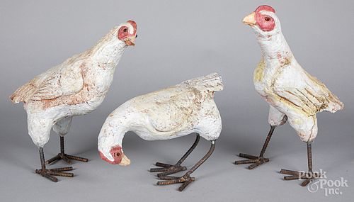 Three terra cotta garden chickens, with iron legs