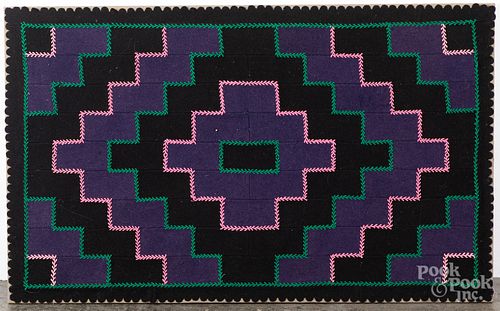 Two geometric felt rugs