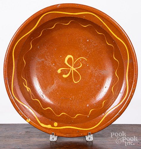 English slip decorated redware bowl, 19th c.