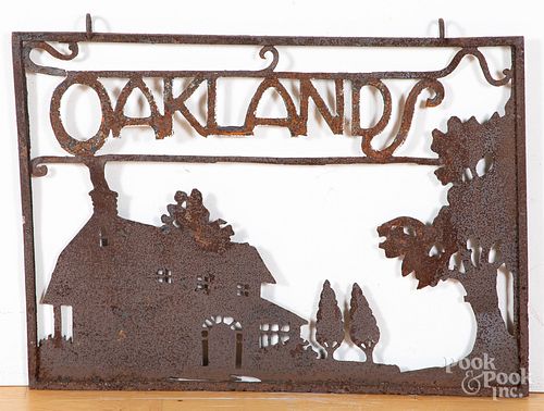 Sheet iron Oakland sign
