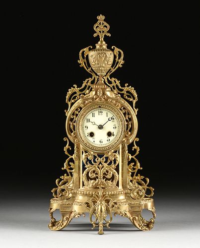 A BAROQUE REVIVAL GILT BRASS MANTEL CLOCK, PROBABLY ENGLISH, EARLY 20TH CENTURY,