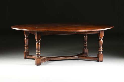 A LARGE CHARLES II STYLE CARVED OAK AND ELM BREAKFAST TABLE, LATE 20TH CENTURY, 