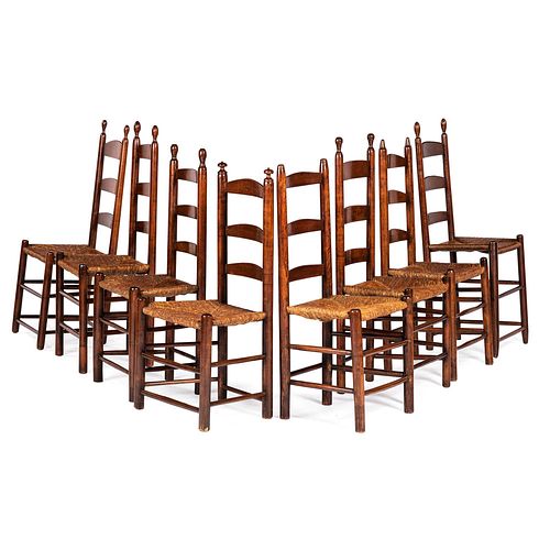 An Assembled Group of Eight Rush Seated Ladder Back Side Chairs