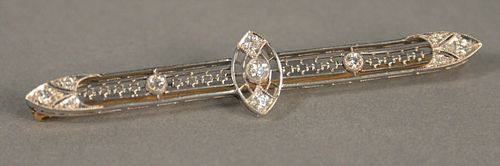 14K gold and white gold bar pin set with eleven diamonds, lg. 2 1/2", 5.5 gr.