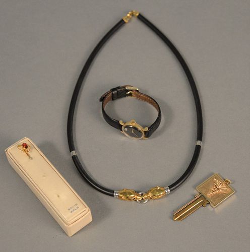 Four piece lot to include necklace with 18K gold ends, key with 14K gold top, 14K Omega ladies wristwatch and gold stick pin.
