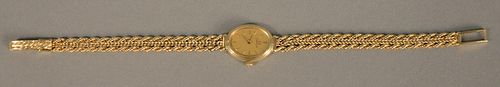 14K gold Omega ladies wristwatch, oval with 14K bracelet, total weight 18.7 gr.