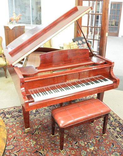 D.H. Baldwin baby grand piano and bench, C152, in excellent condition.