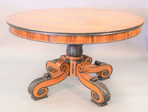 Rosewood veneered round pedestal dining table with one leaf, dia. 51", leaf lg. 20", opens to 51" x 71". Provenance: The Estate of Andrew Wolf, New Ha