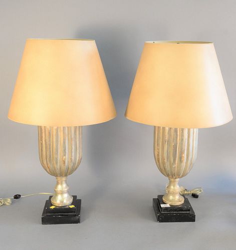 Pair of silvered wood lamps each in urn form on a black lacquered square base, ht. 19 1/2". Estate of Marilyn Ware, Strasburg, PA.