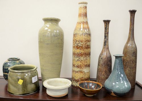 Large group of pottery to include vases, bowls, large vases, black and white jar, etc., approximately twenty-five large pieces and a contemporary eart