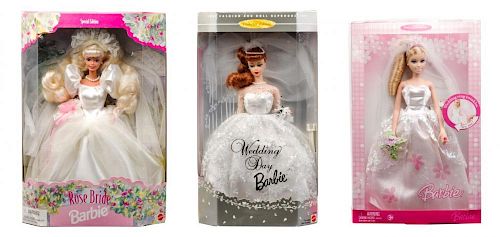 Four Wedding Themed Barbies