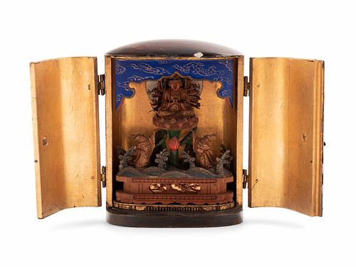 A Polychrome and Gilt Decorated Wood Traveling Shrine with a Gilt Wood Figure of a Multi-Armed Bodhisattva