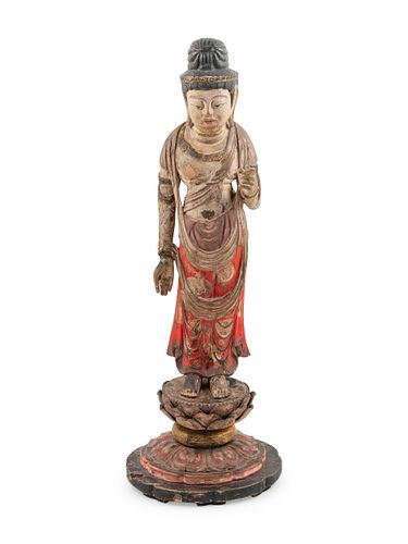 A Carved and Polychrome Lacquered Wood Standing Buddha