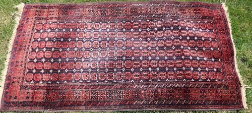 BOKARA SCATTER RUG CA. 1920. RED AND BLUE FIELD.