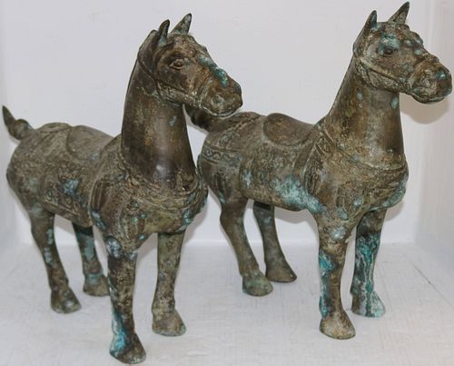 TWO SIMILAR BRONZE CHINESE HORSES. 20TH CENTURY.