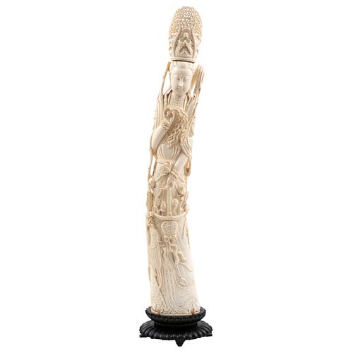 Woman with Headdress, China, Ca. 1900. Carved and inked ivory on a wooden base.